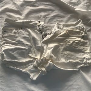 White distressed shorts